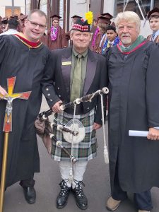 Bagpiper graduation